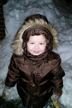 Zac smiling in the snow 