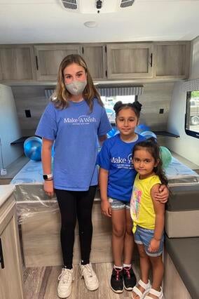 Wish Kid Elmira and sister with Wish Alum Lana