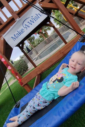 Olivia and her magic carpet swing