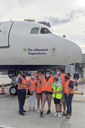 Wish Kid Cole with Family and Plane