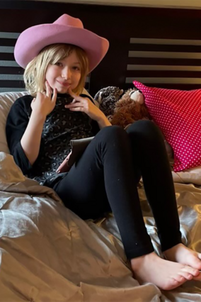 Nina now with cowgirl hat