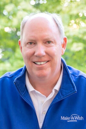 Volunteer spotlight - Bill headshot in blue shirt