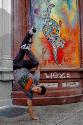 Break Dancer in front of Mural