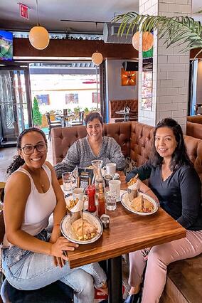 Angela and coworkers at dinner