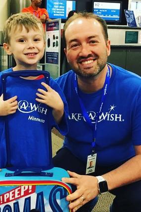 David with wish kid at the airport 