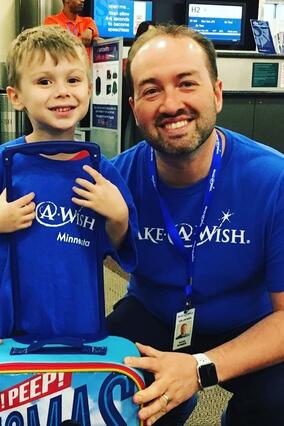 David with wish kid at the airport