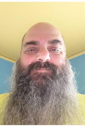 Matt smiling with beard