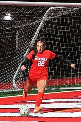 Wish Alum Isabella Playing Soccer