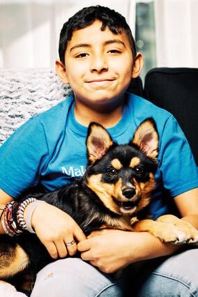 Isaac and pomsky pup Toby