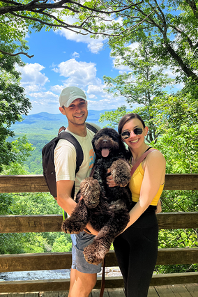 Wish Alum Jason with girlfriend and dog on hike