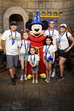 Azul and her family on her Disney wish.