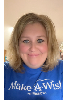 Nicci blonde hair dark eyeliner MAW t-shirt