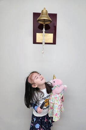 Lily ringing bell