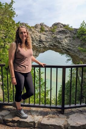 Emma hiking near a lake 