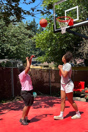 Audrianna playing Basketball