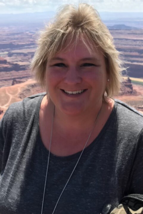 LeAnne smiles at the Grand Canyon