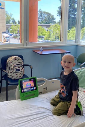 Nolan in his hospital room during treatment in 2023.