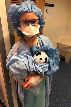Rhydian recovering at the hospital after surgery in 2022.