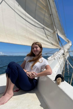 Kaci filled with gratitude on the sailboat