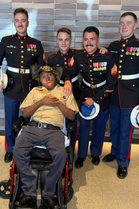 Jamaria and his new friends from the Marines