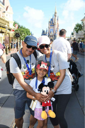 Wish kid Sarah and her parents on her wish to go to Disney World, adopted by Calpine in 2022.