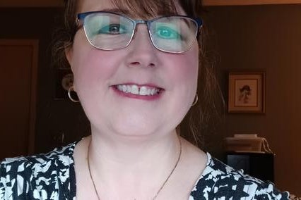 Jennifer smiling in a selfie