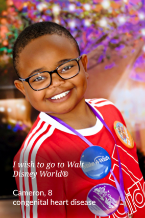 Wish kid Cameron, 8, smiles during his wish trip to Walt Disney World