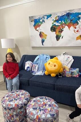 Laney at home with gifts