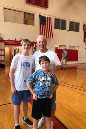 Alumni Wish Kid Will with UNC Basketball Coach Roy Williams