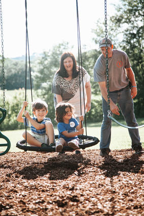 Johanna and family on swing