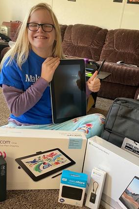 Leah posing with her wish supplies!