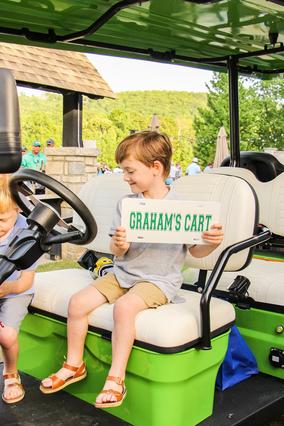 Graham in new golf cart 
