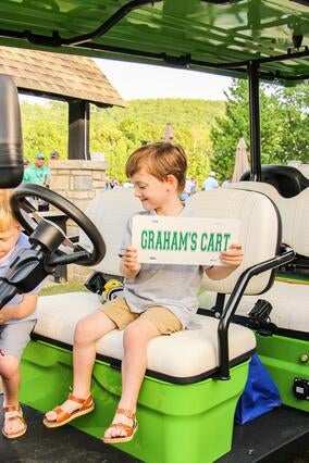 Graham in new golf cart 