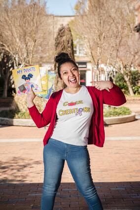 Nicole today holding up a children's book