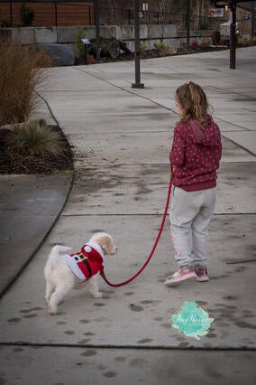 Emily walking her pup Ryder