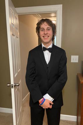 Zach dressed in formal wear for his Junior Prom