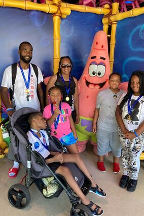 Demetrics and his family meeting Patrick from Spongebob