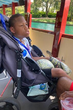 Demetrics riding a boat