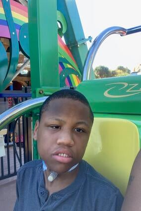 Demetrics riding a ride