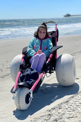 The beach is Sara's happy place.