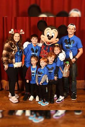 Wish Kid Gatlin and his family with Mickey Mouse