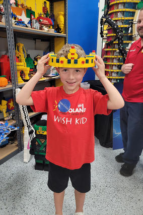 Rowan wearing a Lego crown