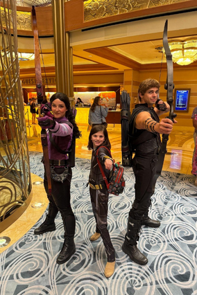 Khloe with characters on the Disney cruise