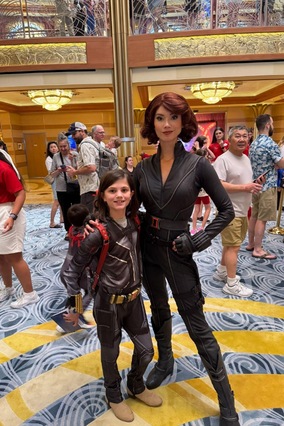 Khloe with a Marvel character