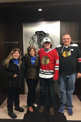 Wish kid Lauren with her family during her wish