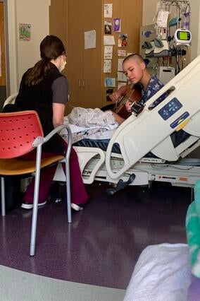 Wish kid Taylor in treatment with her guitar