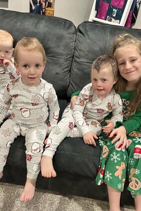 Wish kid Isaac now with family sitting in home theater from wish