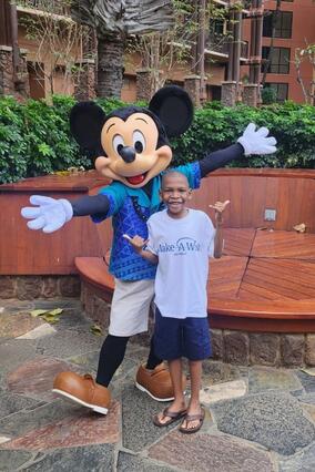 Wish kid Jonas with Mickey Mouse