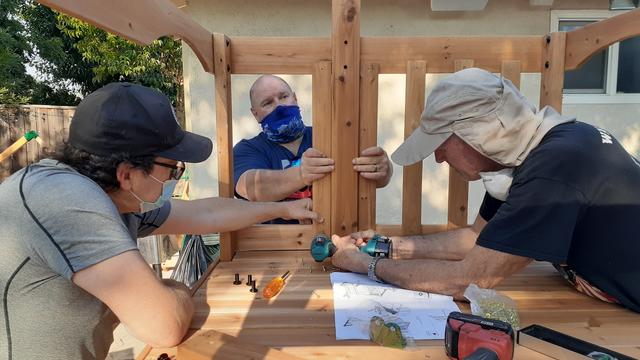 BMS volunteers help build Brooklyn's backyard playset
