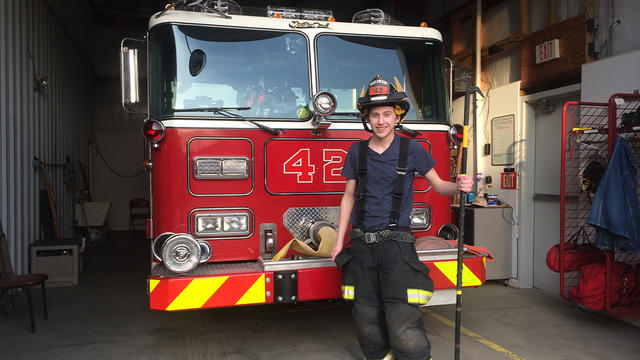 zra shows his support to his community as a firefighter.